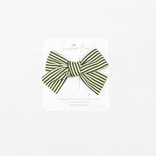 green strip hair bow.